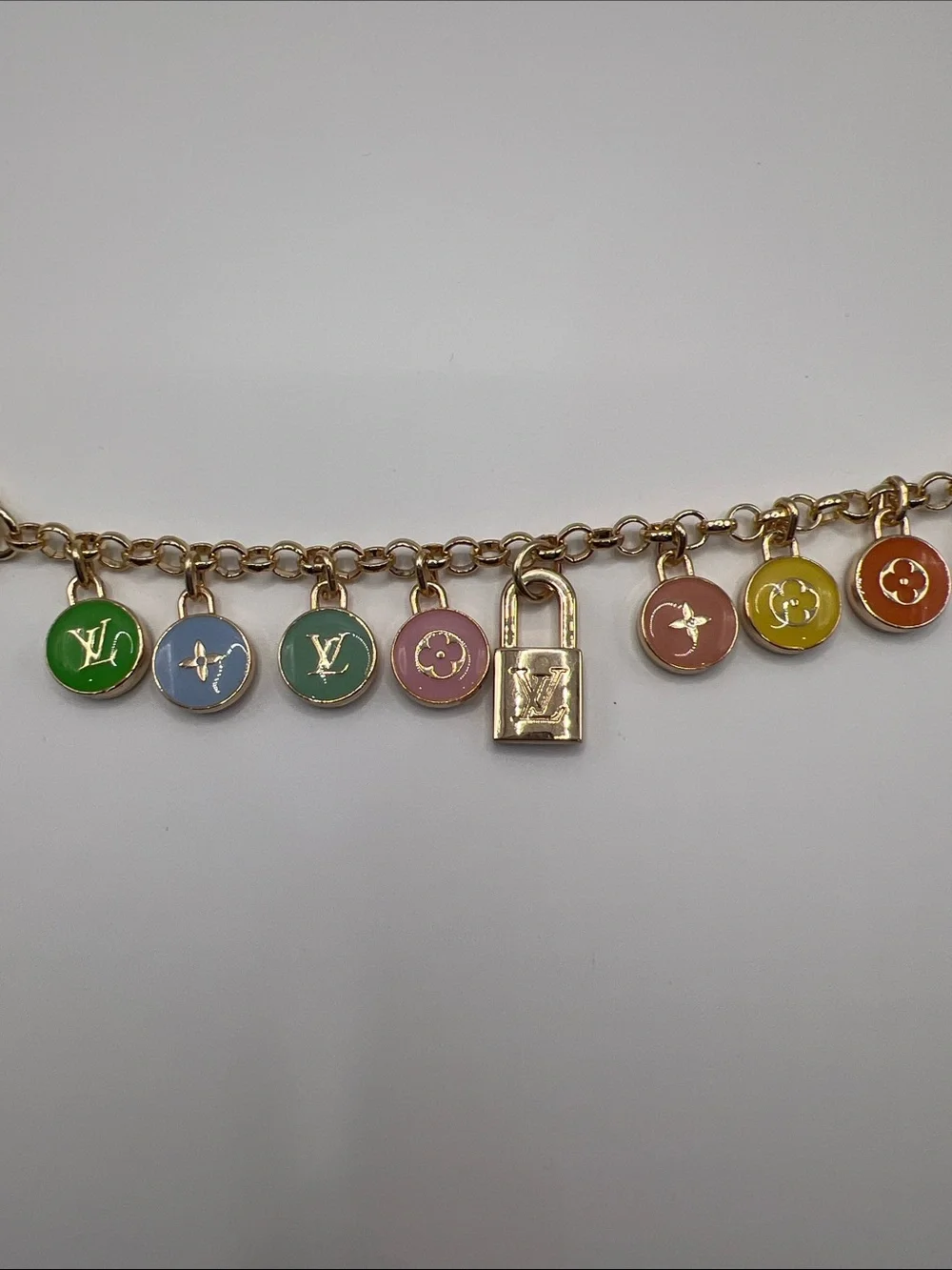 1402. Gold-Tone Multicolor Pastel Enamel Charm Bag Chain 10”